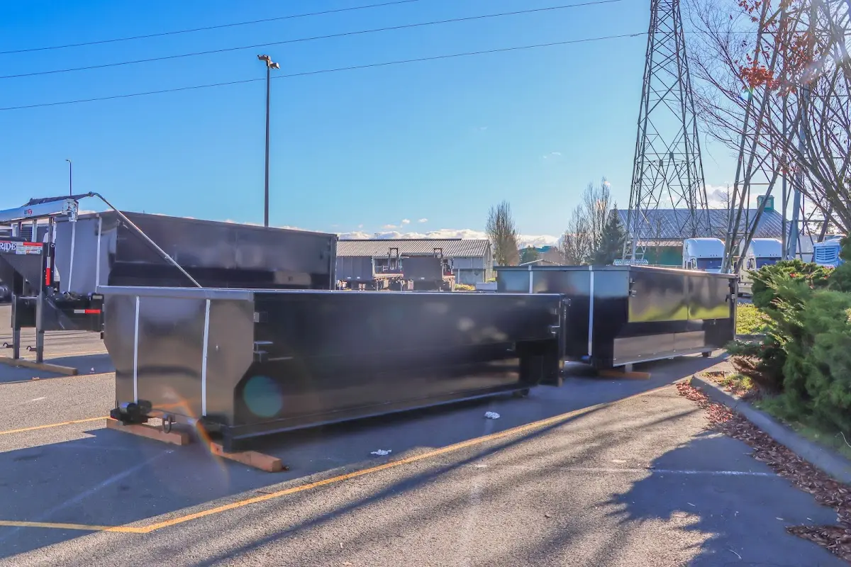 Roll-off dumpster ready for waste disposal at job site for Demolition Dumpster Rental in Belleville
